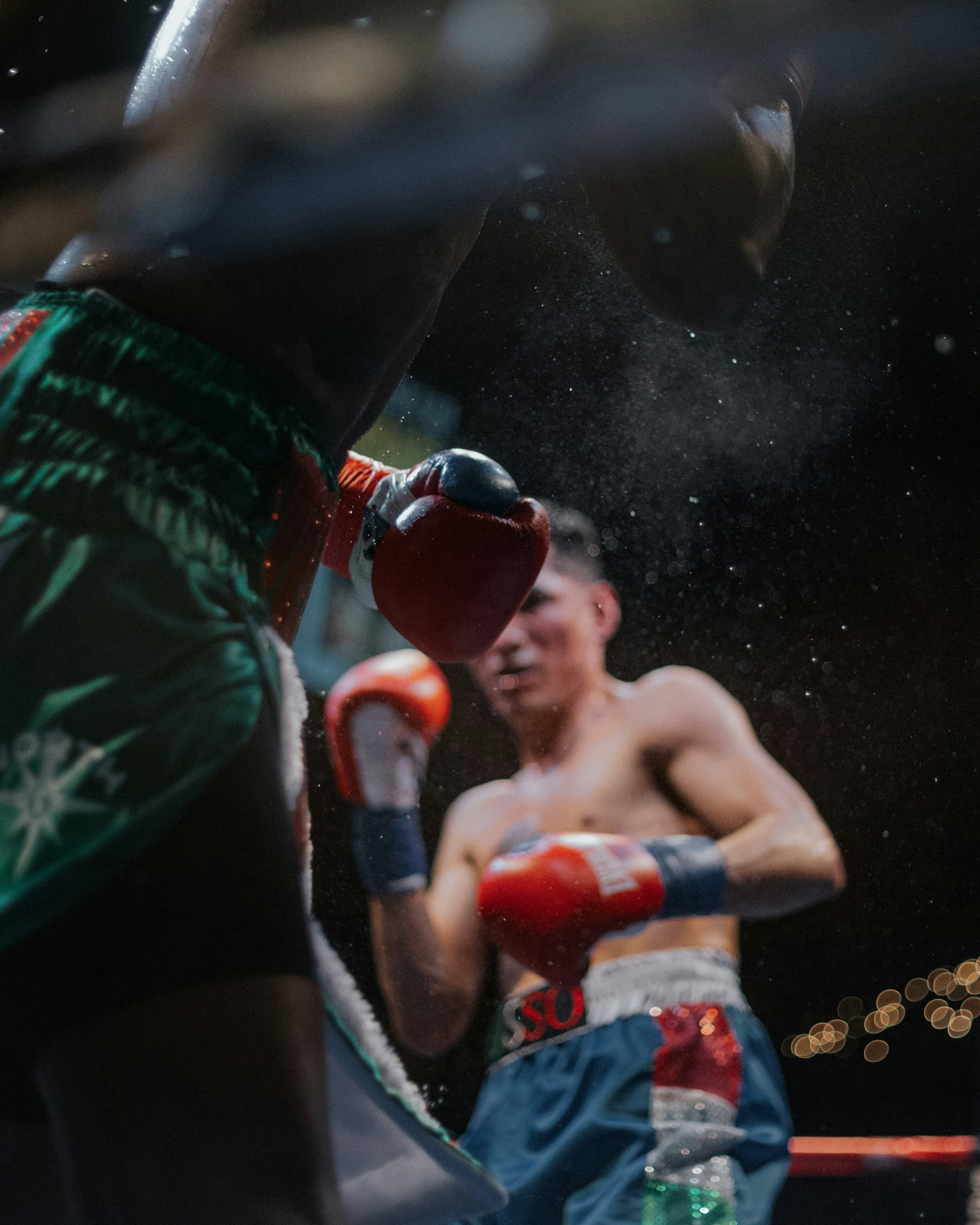 Two boxers in the ring. Photo by Ivana Cajina on Unsplash